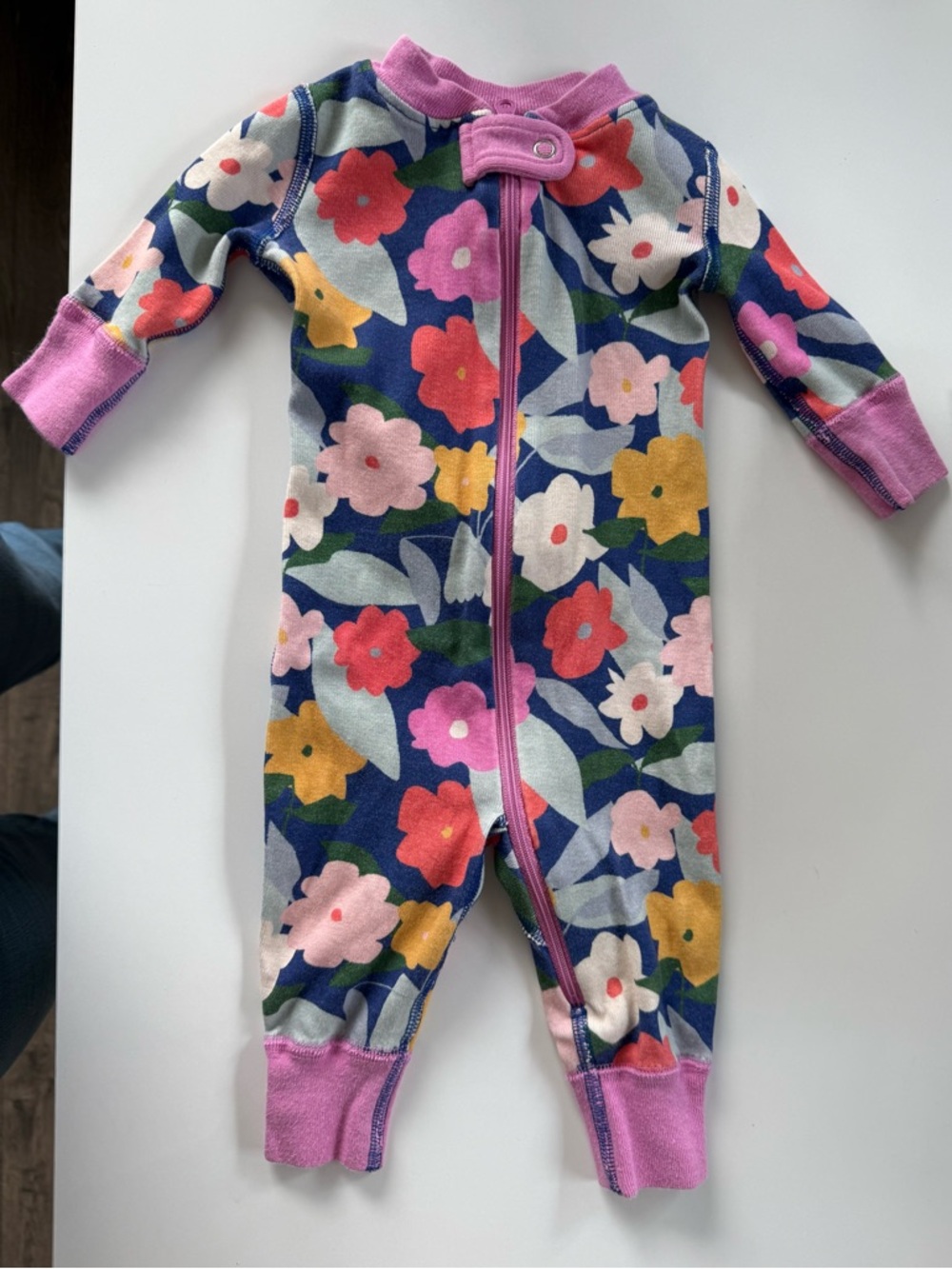 Hanna Andersson Girls Floral Zip-Front One-Piece Pajamas in Navy and Pink